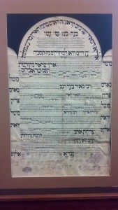 Rabbinic emissary document from Tiberias to communities in Tunisia and Libya, 1922.   Large manuscript on parchment, dated 5682 [1922], intended as a letter of introduction in which the great sages of Tiberias authorize  Rabbi Yaʻaḳov Ṿaḳnin to collect funds for the needy of that city. The first five paragraphs each begin and end with the same word. The top of the document is scalloped with the center taking the form of an arch. The calligraphy is beautifully executed, indicating that the document was probably written by a professional scribe. The document bears the signatures and official stamps of over forty rabbis from the Maghrebi community in Tiberias. The letter is addressed to rabbis and leaders of the large centers of Jewish settlement in Tunisia and Libya. The great Talmudic sage Rabbi Meir, also known as Rabbi Meir Baal ha-Nes, whose tomb is in Tiberias, is referred to frequently to add more gravity to the request of the emissary and the rabbis who sent him.