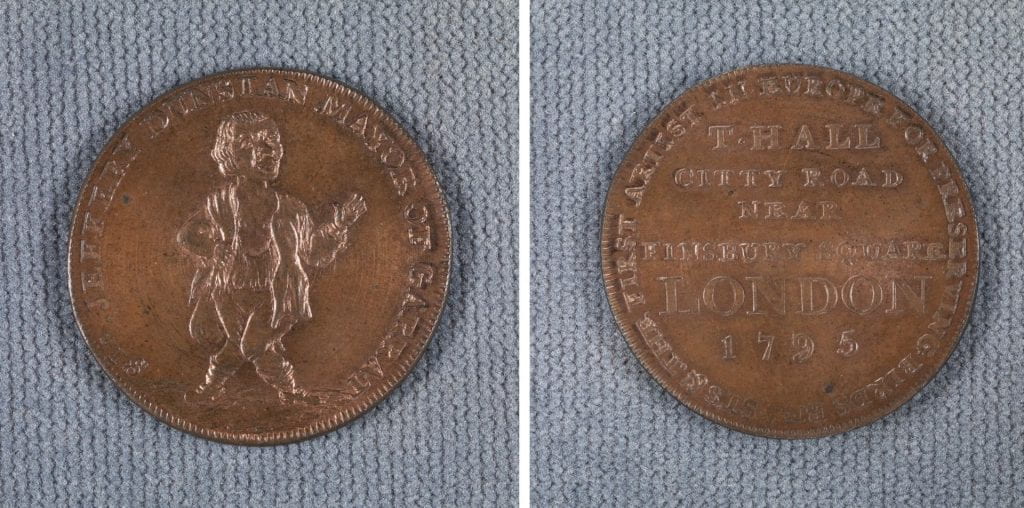 front and back of metal coin