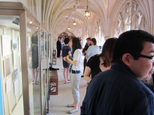 Student Research Exhibit reception attendees in the corridor at Sterling Memorial Library, 13 May 2015.