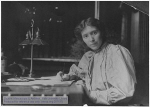 Rose Pastor Stokes (1879-1933), political activist and author, at her desk in her New York City apartment.