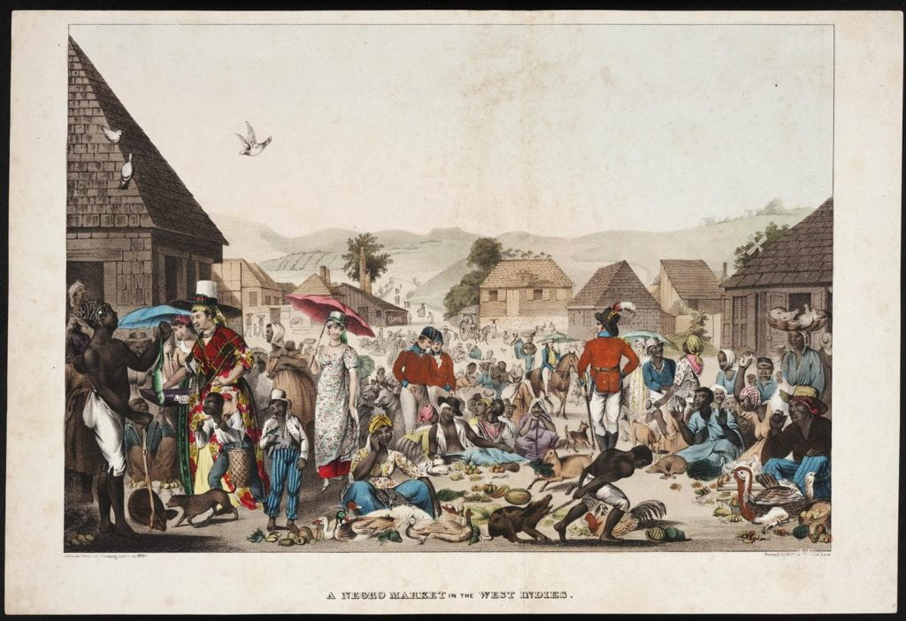 a colorful scene of bustling activity with both black and white people interacting, some seated and some standing, in an open space surrounded by low houses and hills beyond. offered, evidently for sale by some of the black figures, are fish, fowl, fruit, a pig, and other items.