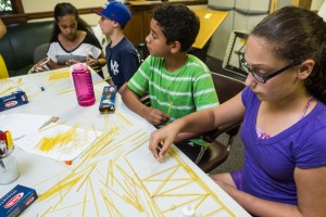 Students designing spaghetti bridges