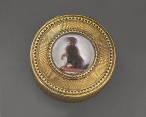 image of round gold snuffbox with wax portrait of a dog